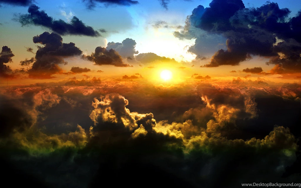 Sunset Over The Clouds Wallpapers