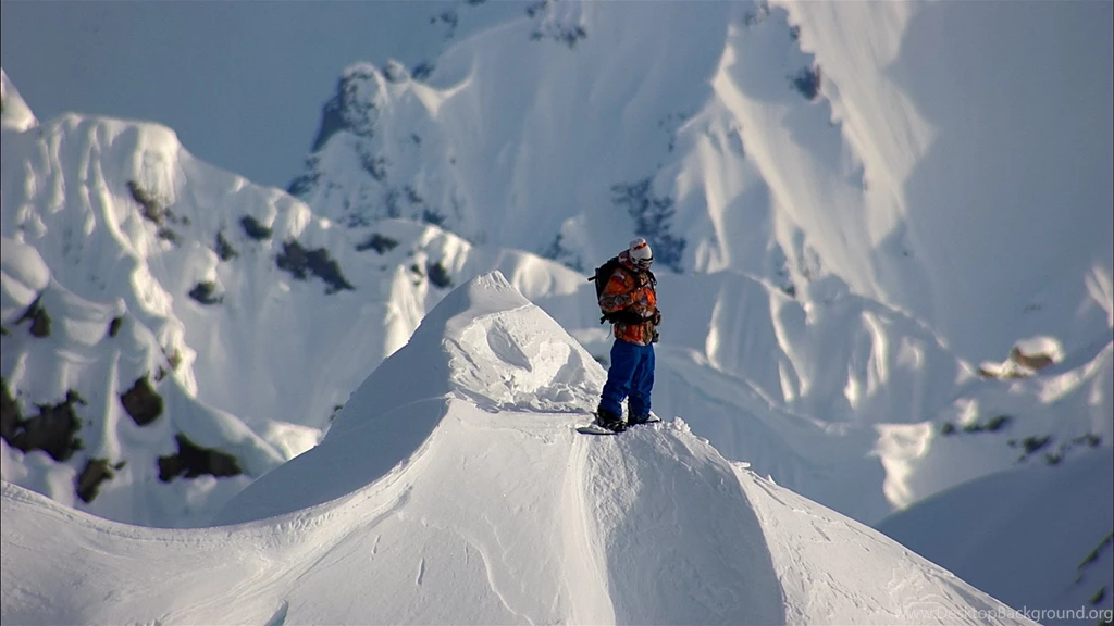 Snowboarder Travis Rice Conquers Treacherous Mountain Face ...