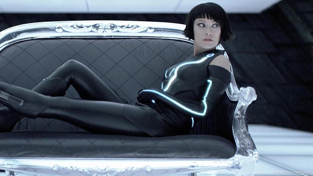 Olivia Wilde On A Sofa In TRON Wallpapers For iPhone 3G/3GS