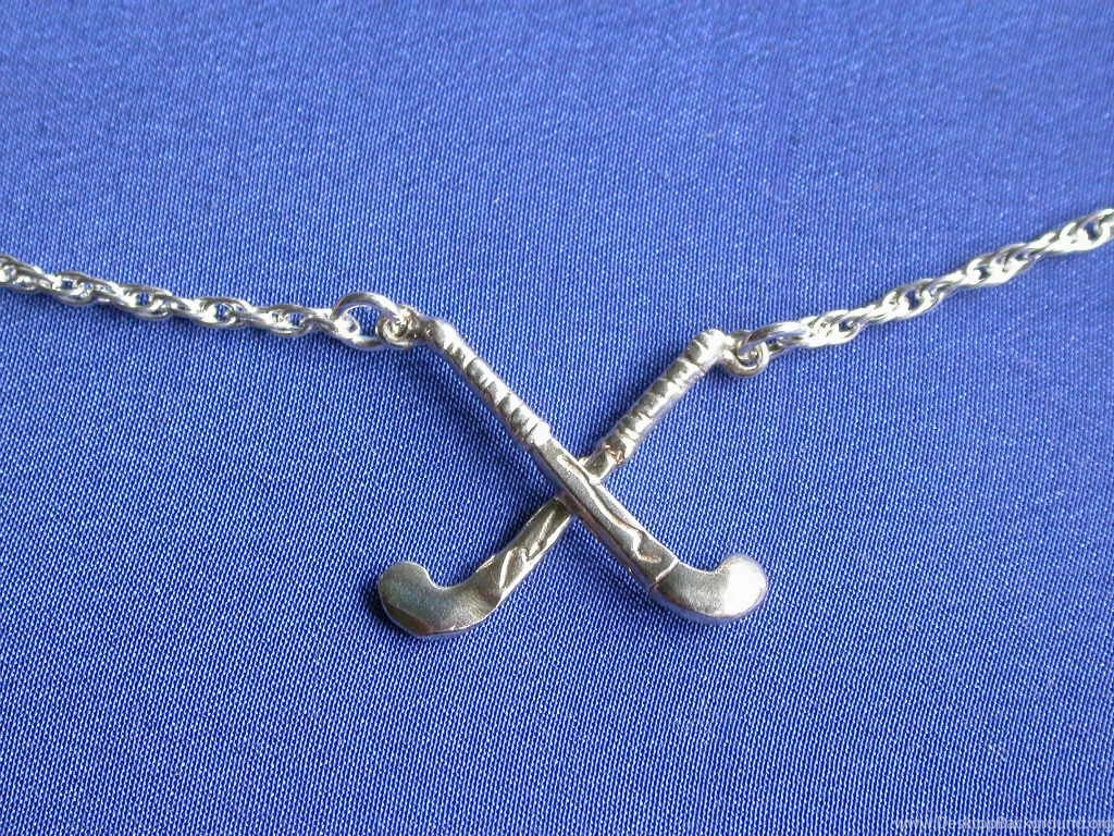 Featuring Handcrafted Silver Sports Jewely