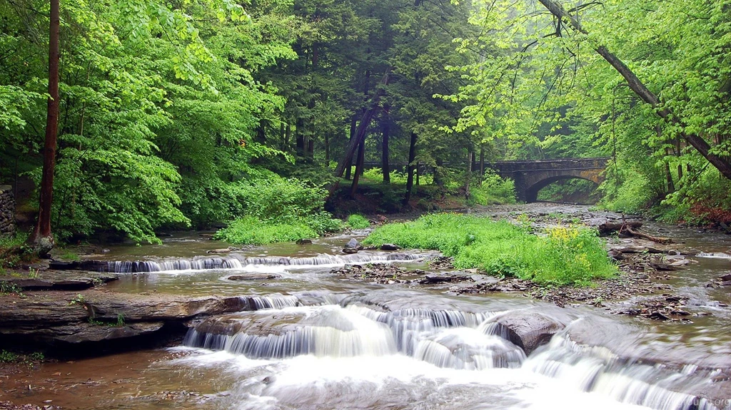 Landscape Image The River In Swift Flow, An Old Bridge Crossing ...