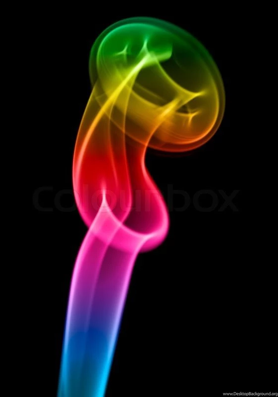 Multi coloured Smoke On A Black Background.