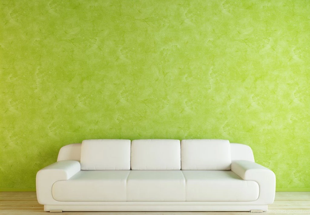 White Sofa With Green Wallpapers