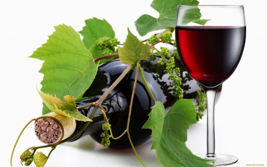 Grape Leaves And A Glass Of Wine