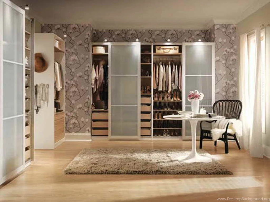 Glossy White Wooden Sliding Closet Doors On Cream Corner Wall With ...