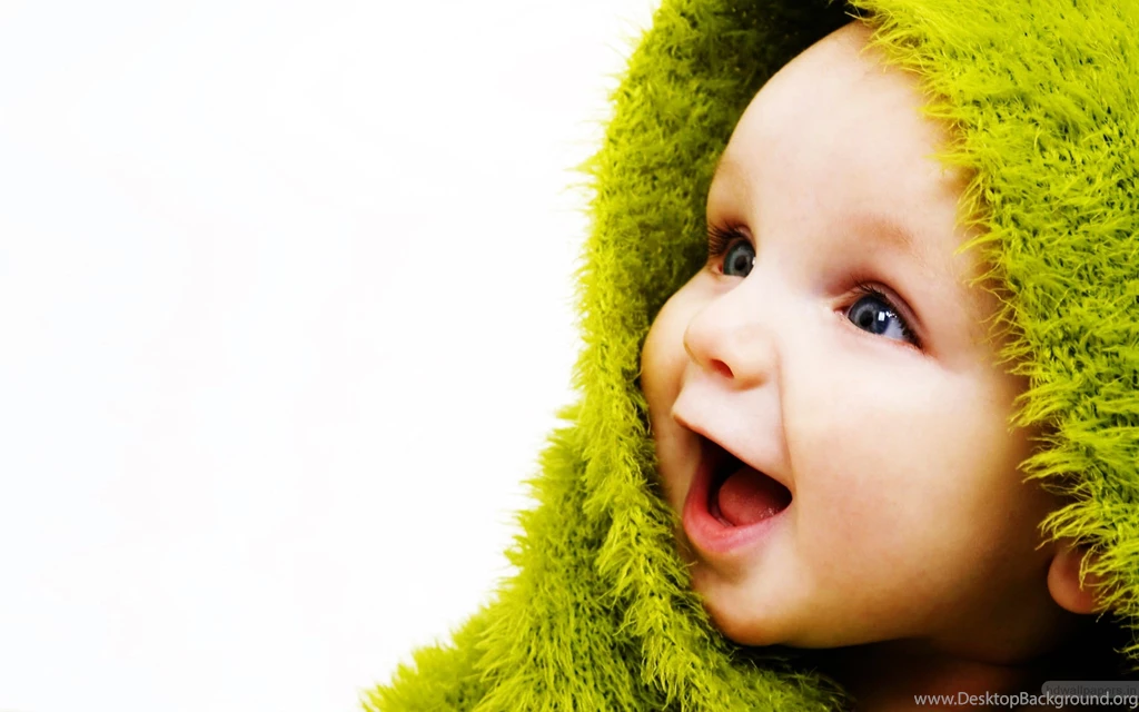Cute Small Baby With Smile In Green Wallpapers
