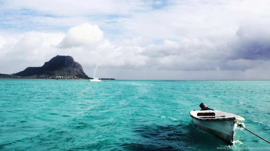 Download 1920x1080 A Boat In A Deep Blue Sea Wallpapers
