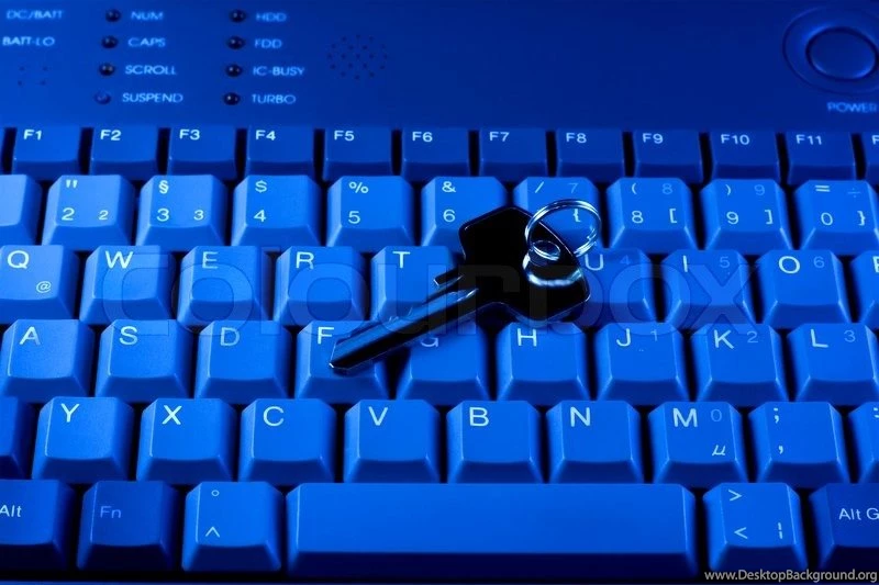 Key Rests Upon Computer Keyboard , Blue Backgrounds