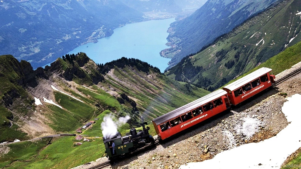 Swiss Train Passing Through Beautiful Swiss Alps
