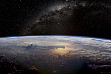 Download 1366x768 Massive Cloud Fronts Visible From Space Wallpapers