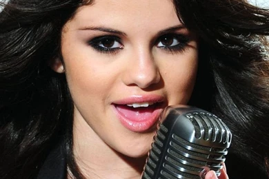 Download Selena Gomez With Microphone Wallpapers For iPhone 4
