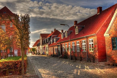 Red brick houses on a cobblestone street hd wallpapers.jpg