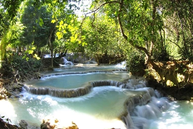 Chinese Photographer Shooting Pictures In Laos