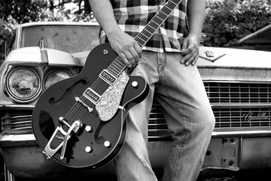 Black electric guitars wallpaper black electric guitar wallpaper electric guitar infront of cadillac car wallpaper.jpg