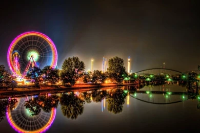 Ferris Wheel By Night Lights Bridge City
