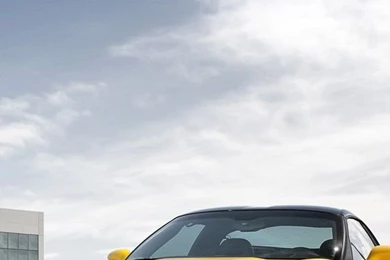 Download Yellow Corvette Z06 Wallpapers For iPhone 4