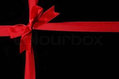 The Bow Of Red Ribbon On Black Backgrounds