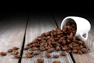 Coffee Beans On Floor Out of Cup Wallpaper.jpg