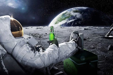 A men in space with a carlsberg beer 1280x800.jpg