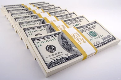 Row Of Stacks Of One Hundred Dollar Bills