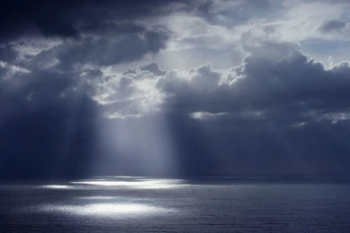 Sunlight Through Dark Clouds   Wallpaper.