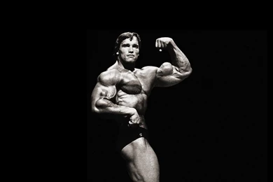 Arnold Schwarzenegger Dark Background HD Wallpapers.jpeg