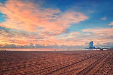 Massive Raked Beach Under Beautiful Sky   (