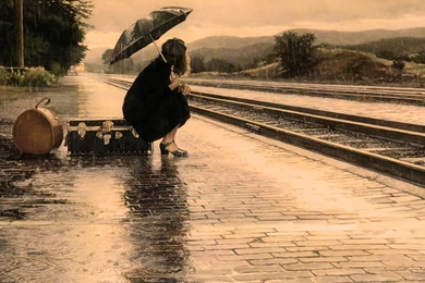 The Girl Was Waiting For A Train In The Rain