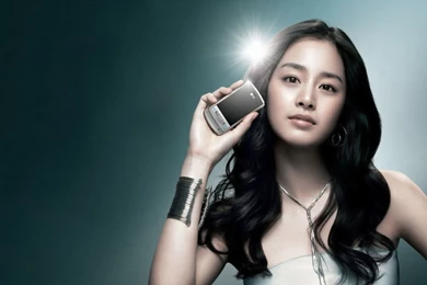 Holding A Bright And Shinning Phone Set, The Girl Is Lighted Up ...