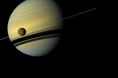 Saturn And Titan By Cassini