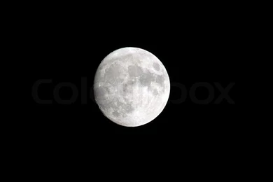 The Full Moon On A Backgrounds Of The Black Sky