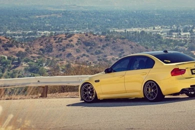 768x1024 Yellow BMW M3 E90 Mountain Road Ipad Mini Wallpapers