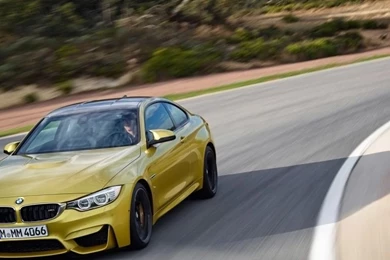 768x1024 2014 BMW M4 Coupe Motion Front Angle Ipad Wallpapers