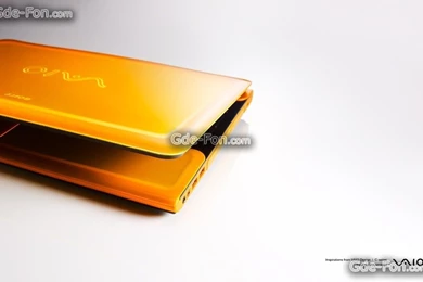 458741_noutbuk_oranzhevyj_belyj fon_Hi Tech_1920x1200_www.Gde Fon.com.jpg