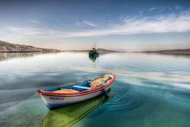 Boat tied up in a peaceful harbor hd wallpapers.jpg