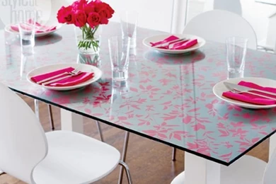 Glass dining room table with wallpaper top.jpg