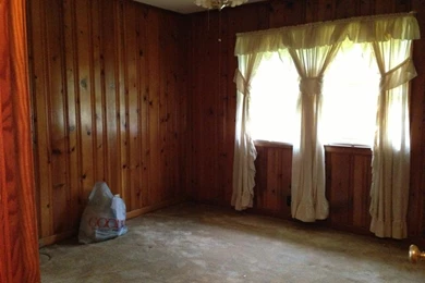 How To Decorate Around Dark Wood Paneling?