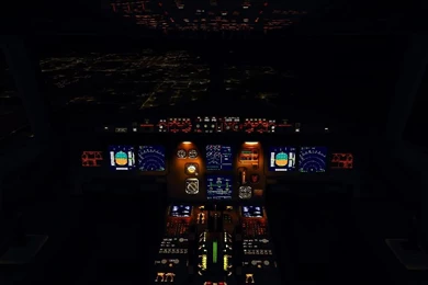 Illuminated Cockpit At Night Of Airbus A321