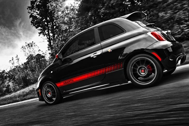 Black fiat 500 abarth in motion on track side view 1600x900.jpg