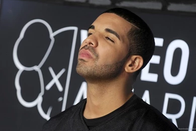 Download 1366x768 Drake In A Black Jersey Wallpapers
