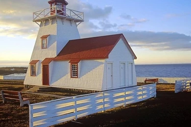 Lighthouse With A White Picket Fence Free Desktop Backgrounds And ...