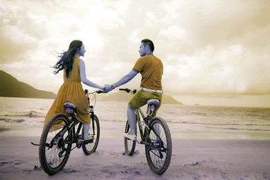 Beautiful Girl And Boy With Bicycle