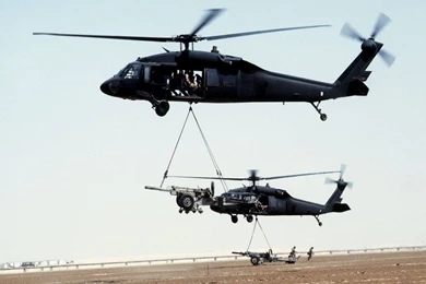 Free Blackhawk Helicopters Transporting Artillery Guns, Army ...