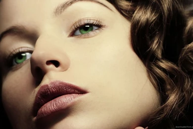 Download 1366x768 Girl With Green Eyes Wallpapers