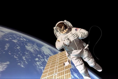 Astronaut Repairing A Satellite Wallpapers