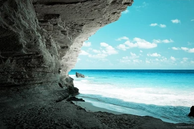 Download 1366x768 Beautiful Ocean View From A Grotto Wallpapers