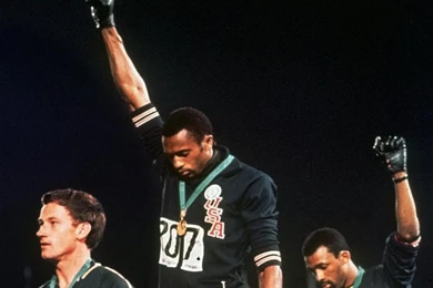 Athlete on black power podium receives apology 8V2443ET x superlarge.jpg
