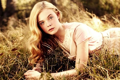 Elle Fanning On Grass Wallpapers.jpg