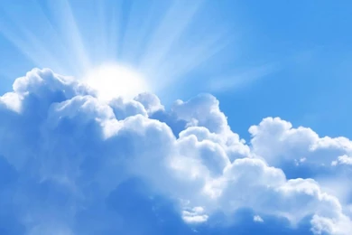 Rising Sun Behind Clouds (