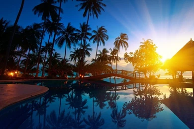 1366x768 Pool Sunset Resort Wallpapers